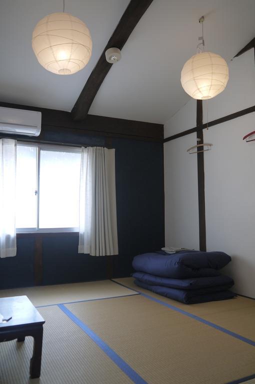 Minatoya Guesthouse Iki Quarto foto