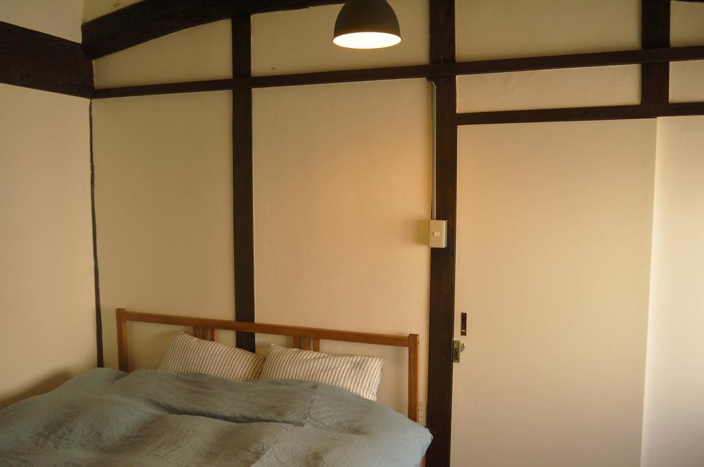Minatoya Guesthouse Iki Quarto foto